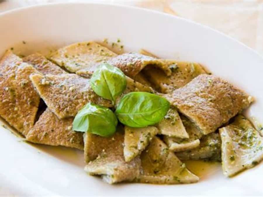Testaroli on the cast-iron testo, food photograph 2